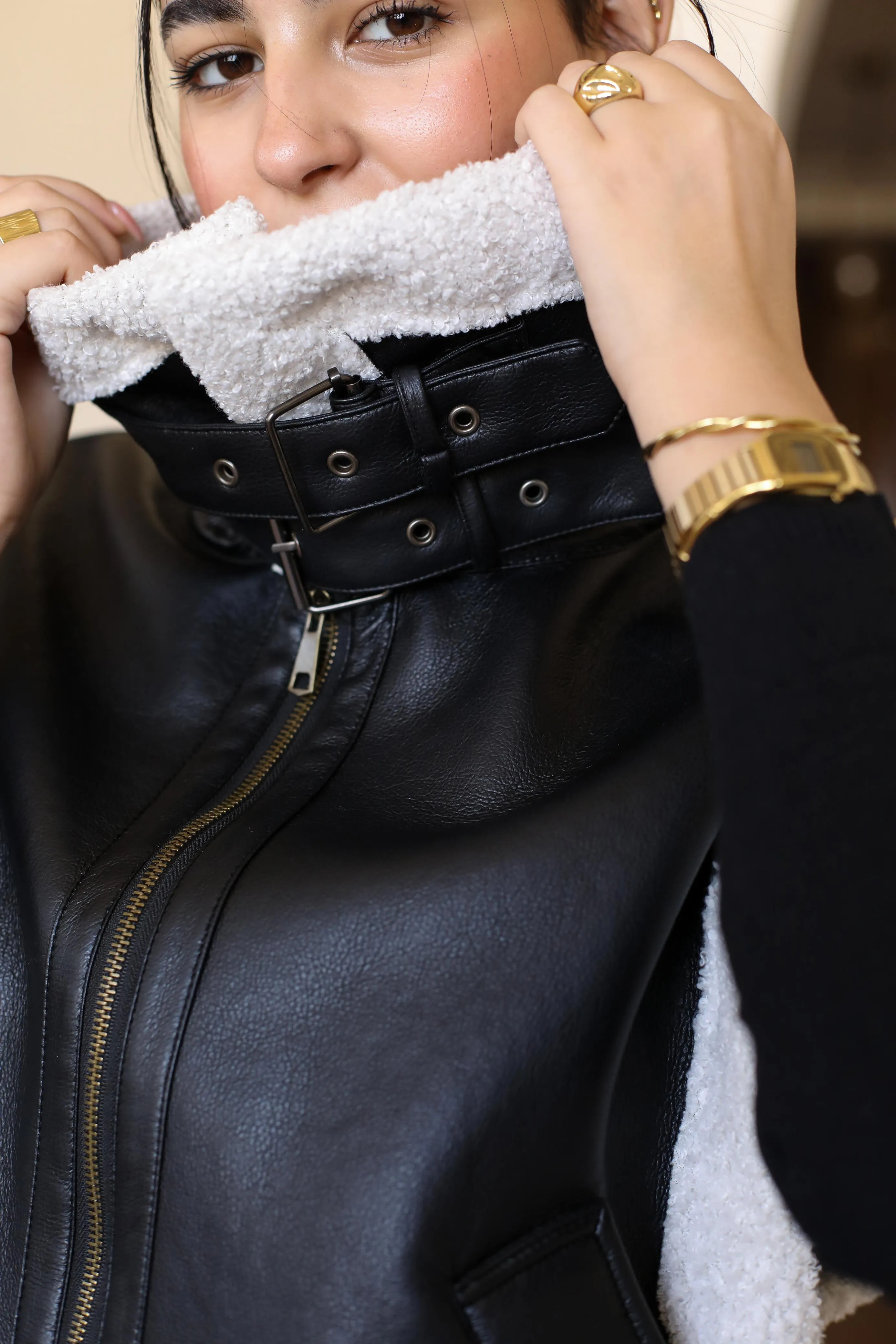 sleeveless leather fur jacket