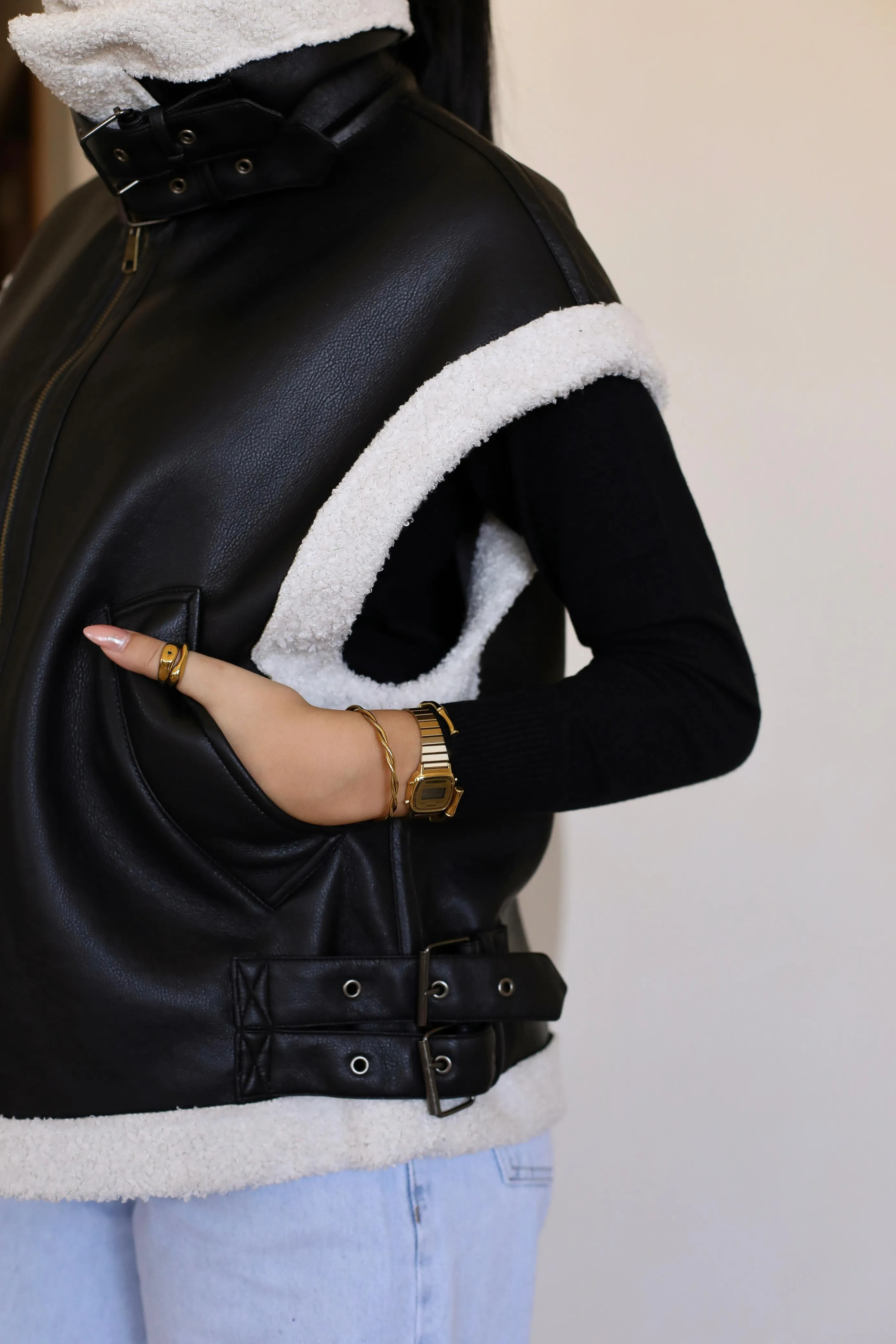 sleeveless leather fur jacket