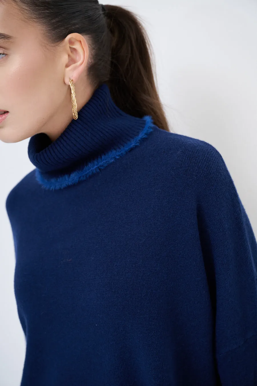 Turtleneck sweater with raw edge details wholesale